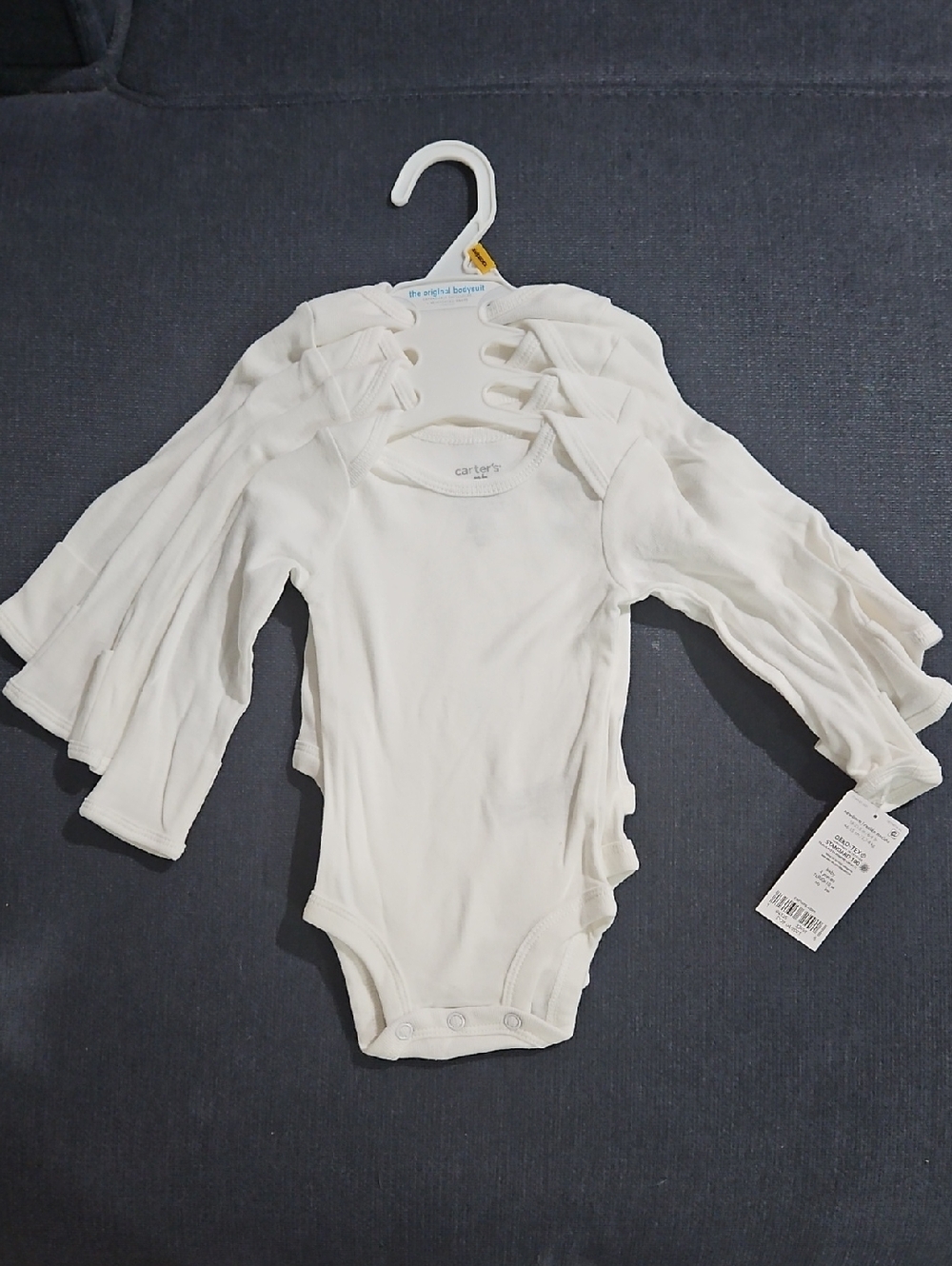 Carters Original Long Sleeved Body Suit 4 Pack